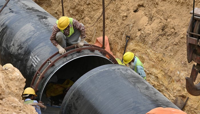 This image shows KWSIPs workers working on a water supply pipeline site on October 5, 2024. — Facebook@KWSSIP