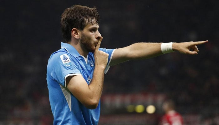 Napoli’s Khvicha Kvaratskhelia celebrates after scoring his side’s second goal during the Serie A match against AC Milan at San Siro, Milan, on Oct 29, 2024. — AFP