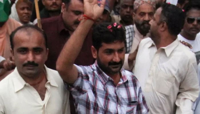 Uzair Baloch (centre) and others seen in this image. — Reuters/file