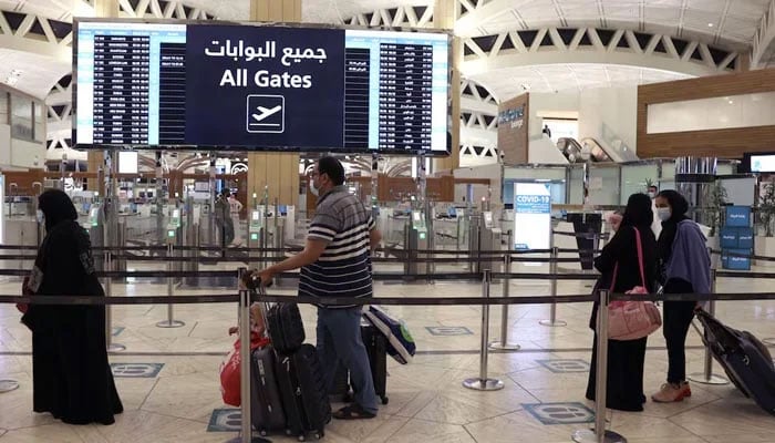 A representational image of passengers at an Airport. — AFP/File