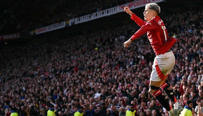 Manchester Uniteds midfielder Alejandro Garnacho celebrates scoring his teams first goal during the English Premier League football match against Brentford at Old Trafford in Manchester, north west England, on October 19, 2024. — AFP