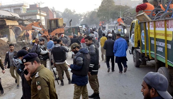 A representational image of anti-encroachment operation in progress removes illegal encroachment during the anti-encroachment drive in Lahore on December 21, 2023. — PPI