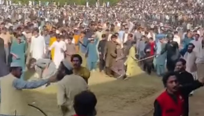 The image shows people fighting at the playground during a cricket match in Bajaur. — Screengrab via Facebook/Bajaur Sports Complex