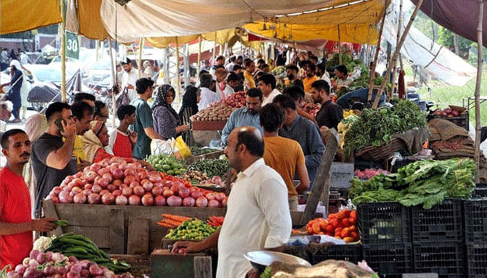 People buy vegetables and fruits at a weekly Bazar located in the Shadman area of Lahore on September 22, 2024. — PPI