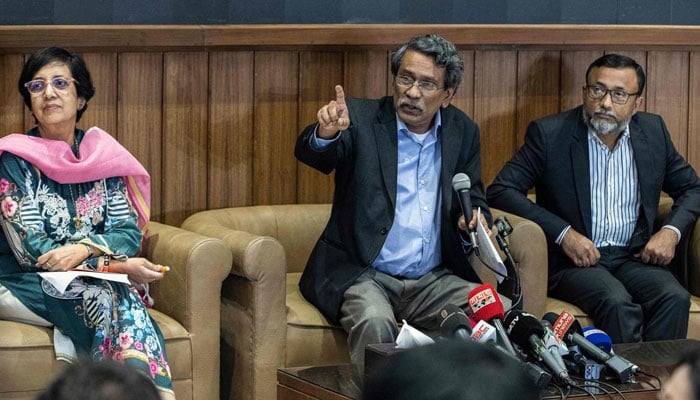 Ali Riaz (centre), head of the Bangladesh Constitutional Reform Commission, speaks during a press conference in Dhaka on November 3, 2024. — AFP