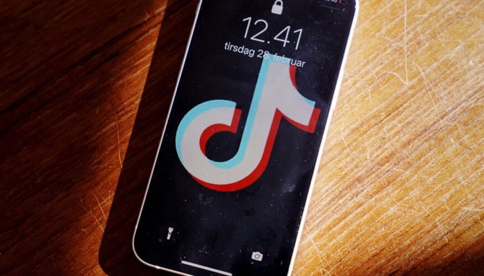 TikTok logo can be seen on a mobile phone. — AFP/File