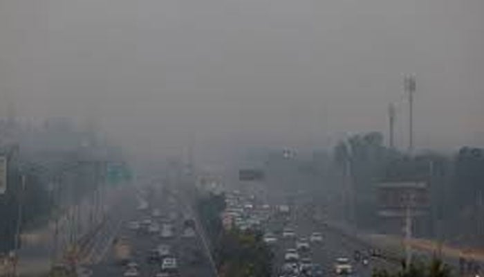 Vehicles ride past on an expressway on a smoggy morning in New Delhi, India,  on October 31, 2024.— Reuters