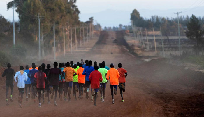 Kenyan atheletes can be seen  running. — AFP/File