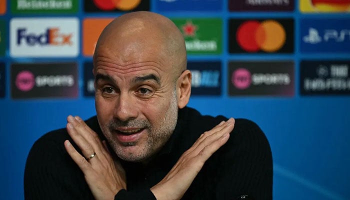 Manchester City’s Spanish manager Pep Guardiola attends a press conference at Manchester City’s training ground in Manchester, north-west England, on October 22, 2024. — AFP