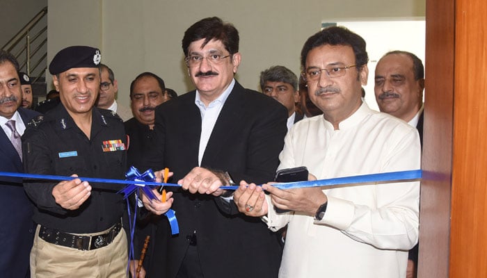 Sindh Chief Minister Syed Murad Ali Shah (centre) along with Home Minister Ziaul Hassan Lanjar (right) and Sindh police chief Ghulam Nabi Memon (left) cuts the ribbon to inaugurate the Fusion Centre of the Counter Terrorism Department (CTD) on November 5, 2024. — Facebook@SindhCMHouse