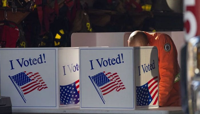 A voter casts his ballot at polling location inside Pittsburgh Bureau of Fire Engine Company in the Lincoln-Lemington-Belmar neighborhood of Pittsburgh, Pennsylvania on November 5, 2024.—AFP/file