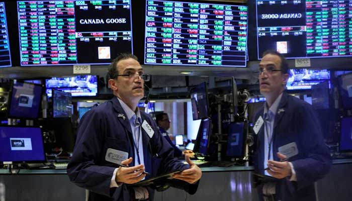 Traders work on the floor of the New York Stock Exchange (NYSE) in New York City, US on June 14, 2022. — Reuters