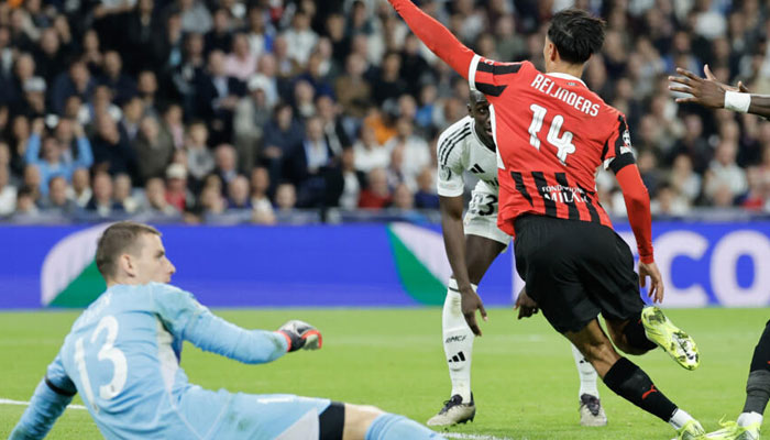 AC Milans Dutch midfielder Tijjani Reijnders (right) celebrates scoring their third goal against Real Madrid.—AFP/File