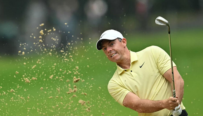 Golf player Rory McIlroy can be seen in action. — AFP/File