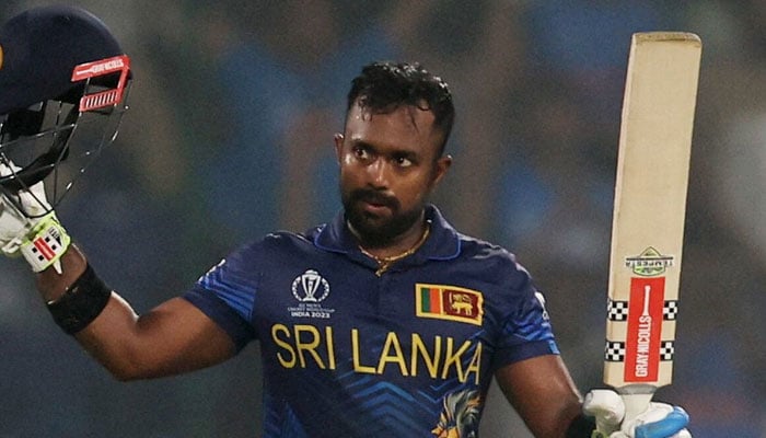 Sri Lankas Charith Asalanka celebrates after reaching his century on November 6, 2023. — Reuters