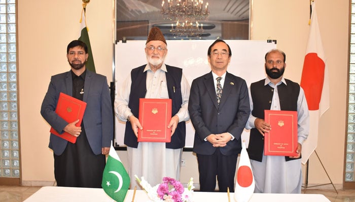 Ambassador of Japan Wada Mitsuhiro (from right to left) pose for a group photo after signing a grant with local NGOs for development projects in Pakistan on November 6, 2024. — Facebook@JapanEmbassyPakistan