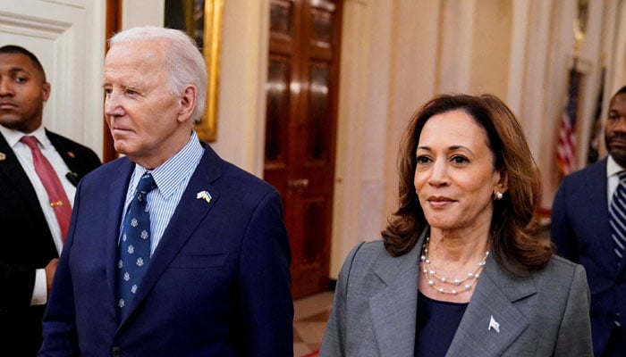 US President Joe Biden (left) and Vice President Kamala Harris (right) walk to deliver remarks on gun violence in America, at the White House in Washington, US on September 26, 2024. — Reuters