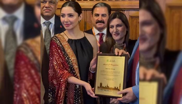 Pakistani actress Mahira Khan receiving an award in the UK Parliament in recognition of her remarkable contributions to the global cinema and her role as a cultural ambassador. — reporter/file