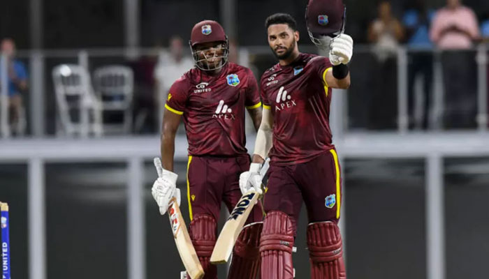 Keacy Carty (left) congratulates West Indies team-mate Brandon King (right) in Wednesdays ODI win over England. — AFP/File