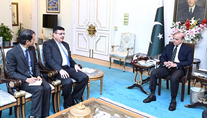 Outgoing Ambassador of Nepal Tapas Adhikari (centre) pays a farewell meeting with Prime Minister Shehbaz Sharif (right) at the Prime Ministers House on November 7, 2024. — APP