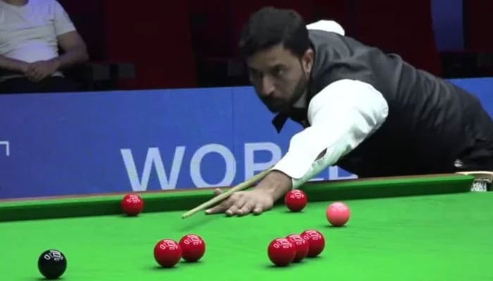 Pakistani cueist Muhammad Asif in action during IBSF World Snooker Championship. — Reporter/file