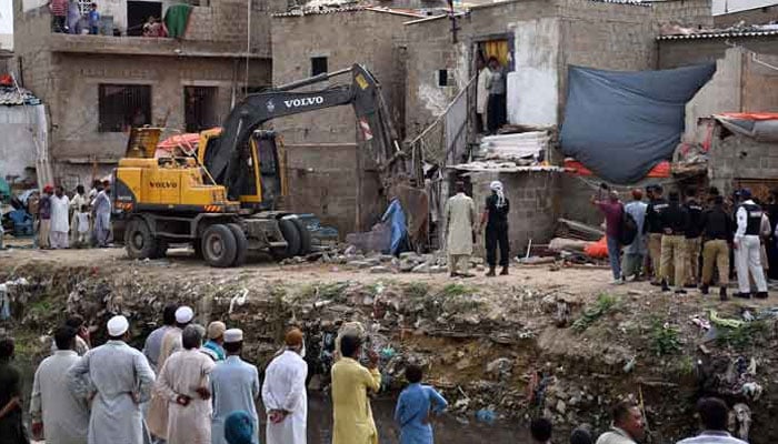 This representational image shows workers of Anti Encroachment Squad   demolishing the illegal constructions during anti-encroachment operation in Karachi. — Online/File