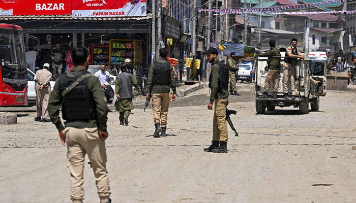 Security personnel patrol during an election campaign rally near Jamia Masjid mosque in Srinagar, Indian Illegally Occupied Jammu & Kashmir (IIOJK) on May 6, 2024 — AFP