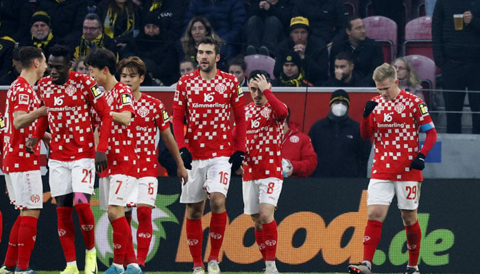 FSV Mainz 05s Jonathan Burkardt (right) celebrates scoring their second goal with teammates. — Reuters/File