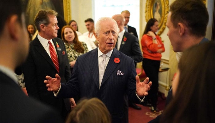 King Charles III (centre) seen amid a function. — AFP/file