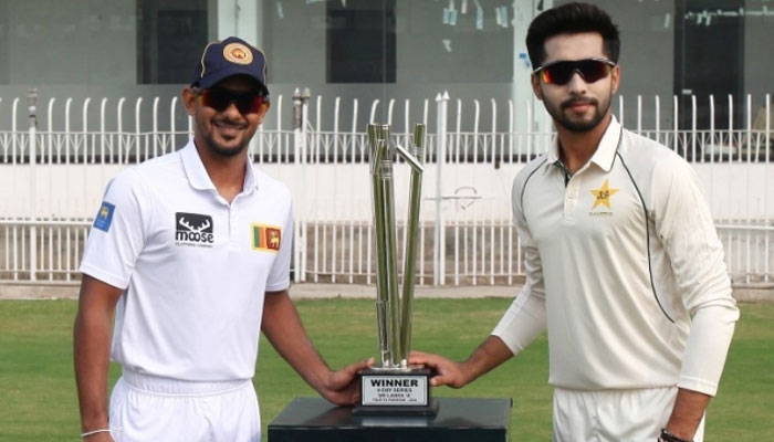 Pakistan Shaheens skipper Muhammad Hurraira (right) and Sri Lanka A captain Danushka Gunathilak seen with a trophy in this image. — AFP/File