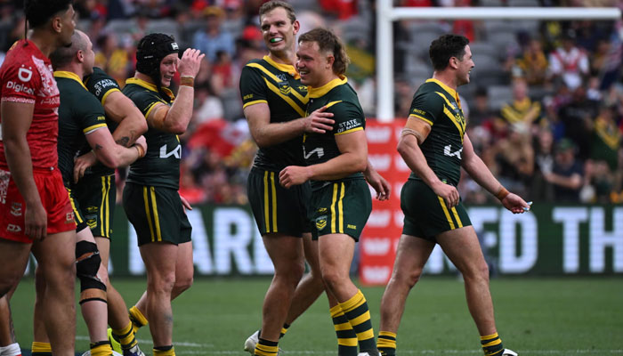 The Australian players celebrate winning the Mens Pacific Championships Rugby League final. — AFP/File