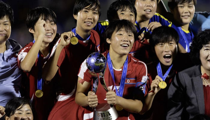 North Korea players celebrate after winning the U17 Womens World Cup a week ago. — AFP/File