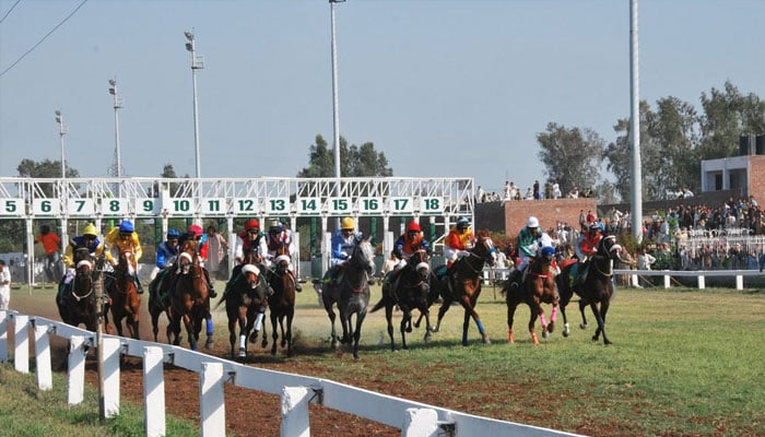 This still taken from a video released on November 13, 2023, shows participants during a horse race in Lahore. — YouTube@PakistanHorseRacing/file