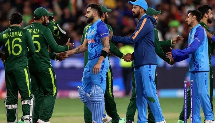 Pakistani and Indian players shake hands after the ICC mens T20 World Cup 2022 match at Melbourne Cricket Ground in Melbourne on October 23, 2022. — AFP