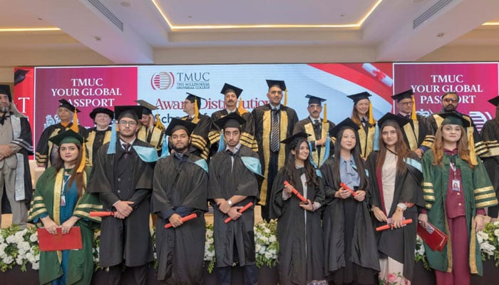 Students pose for a group photo during a graduation ceremony at the Millennium Universal College  (TMUC) Islamabad on November 11, 2024. — Facebook@tmuc.Islamabad