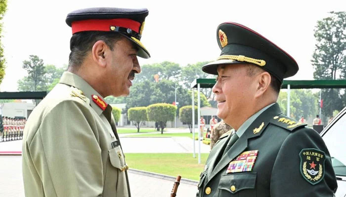 Chief of Army Staff General Syed Asim Munir (left) meets Commander of the Peoples Liberation Army Ground Forces General Li Qiaoming at the General Headquarters in Rawalpindi on August 26, 2024. — ISPR