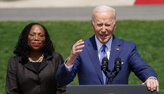 US President Joe Biden delivers remarks on Judge Ketanji Brown Jackson’s confirmation as the first Black woman to serve on the US Supreme Court, as Jackson stands at his side during a celebration event on the South Lawn at the White House in Washington, US, April 8, 2022. — Reuters