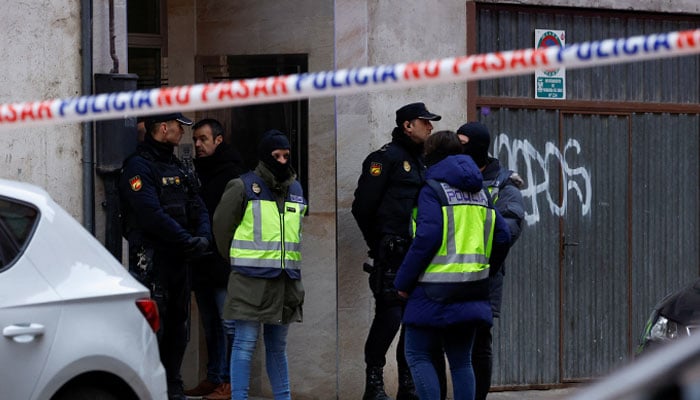 Spanish police officers guard outside a building after the arrest of a man suspected of being the sender of letter-bombs in November and December to the Ukrainian and US embassies and several institutions in Spain, in Miranda de Ebro, Spain January 25, 2023. —Reuters