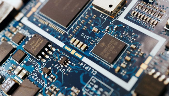 Semiconductor chips are seen on a circuit board of a computer in this illustration picture taken on February 25, 2022. — Reuters