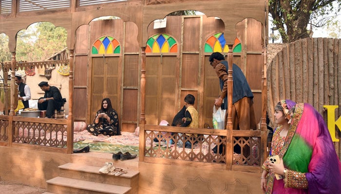 Family enjoys green tea on KP stall during Annual Lok Mela, at Lok Virsa, in Islamabad on November 13, 2024. — Online