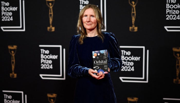 British writer Samantha Harvey poses on the red carpet upon arrival for the Booker Prize Award announcement ceremony, at the Old Billingsgate, in London, on November 12, 2024. — AFP