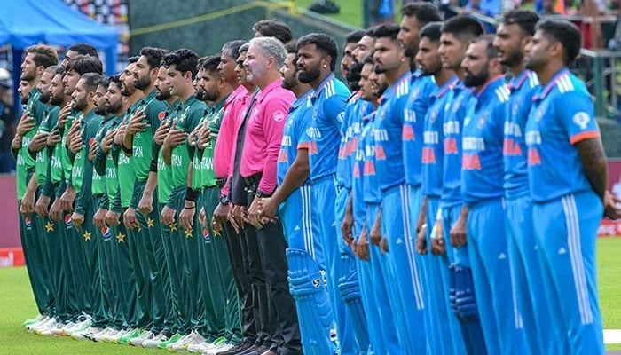 Pakistans and Indias players stand for national anthems before the start of the Asia Cup 2023 one-day international (ODI) cricket match between the two teams at the Pallekele International Cricket Stadium in Kandy on September 2, 2023. — AFP