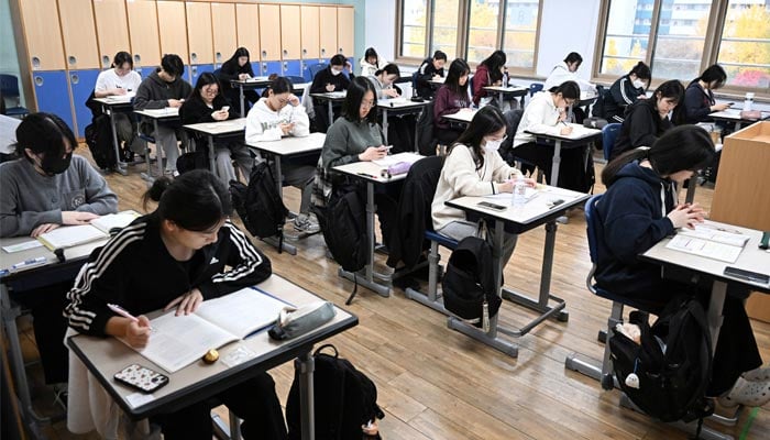 South Korean students wait to take the annual College Scholastic Ability Test, known locally as Suneung, at a school in Seoul on November 14, 2024. — AFP