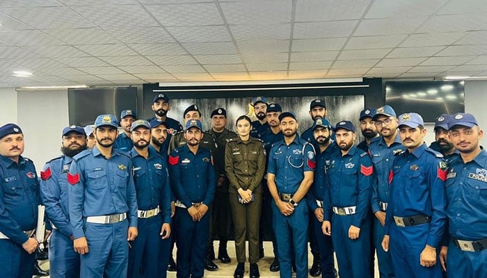 Chief Traffic Officer (CTO) Rawalpindi Beenish Fatima in a group photo with promoted traffic police officials at the City Traffic Police Rawalpindi headquarters on November 15, 2024. — Facebook@ctprwp