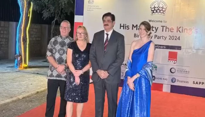 Sindh Chief Minister Syed Murad Ali Shah (2nd right) pose for a photo at a reception in honour of Majesty King Charles III in connection with his 76th birthday on November 15, 2024. — Screengrab via Facebook@OfficialGoS