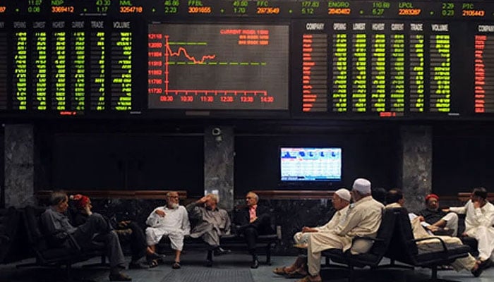 Investors are sitting in the hall of Pakistan Stock Exchange in Karachi. — AFP/file