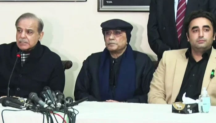 (Left to right) Prime Minister Shehbaz Sharif, President Asif Ali Zardari, and PPP Chairman Bilawal Bhutto-Zardari during a press conference in Islamabad, on February 21, 2024, in this still taken from a video. — Geo News