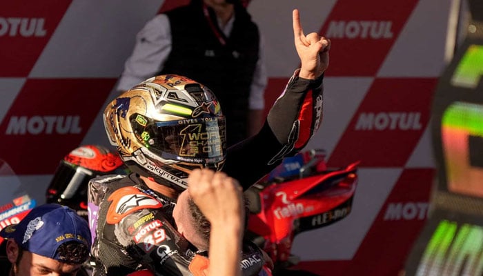 Ducati Spanish rider Jorge Martin celebrates becoming the new world champion after the MotoGP Solidarity Grand Prix of Barcelona at the Circuit de Catalunya on November 17, 2024 in Montmelo on the outskirts of Barcelona. — AFP