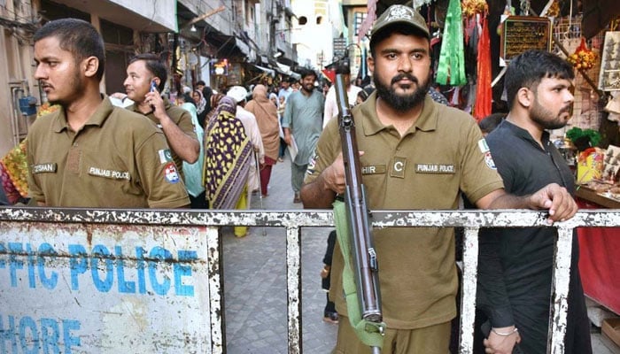 A representational image showing Punjab police personnel standing guard in Lahore on July 11, 2024. — APP