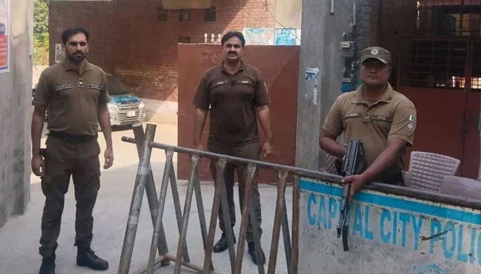 Punjab police personnel stand guard in the city on October 3, 2023. — Facebook@DIGOpsLahore